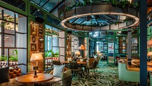 A cozy indoor space with seating areas, tables, and a circular light fixture. - Hyatt Centric City Centre Kuala Lumpur (Kuala Lumpur)