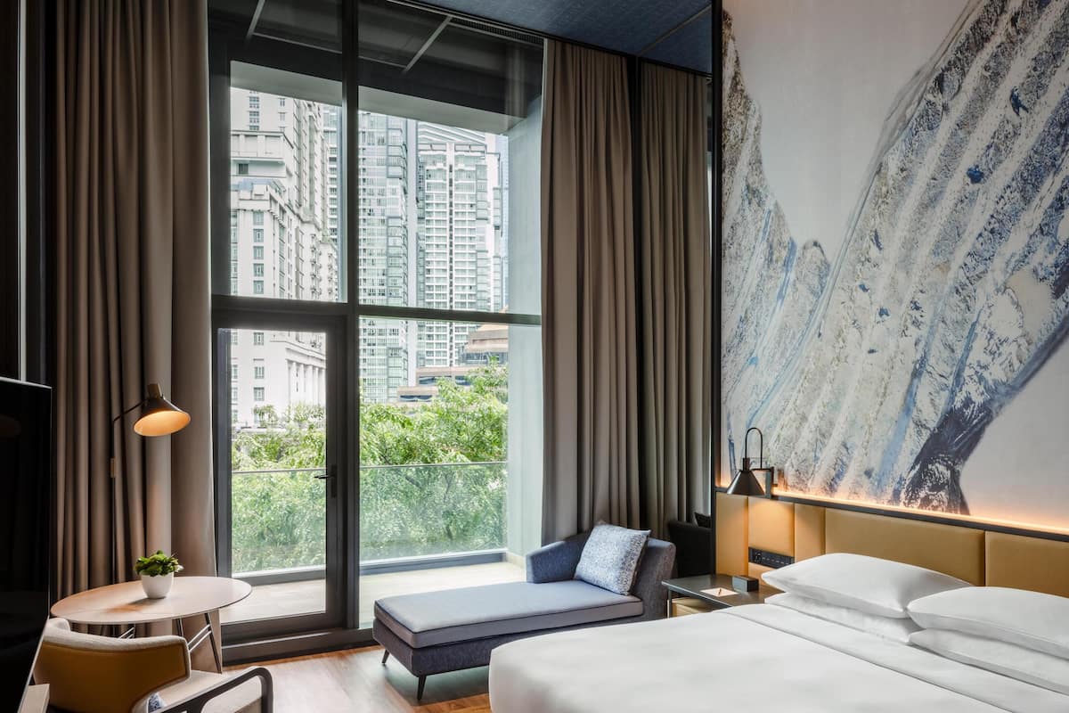 Deluxe Room, 1 King Bed, Balcony | 1 bedroom, hypo-allergenic bedding, minibar, in-room safe