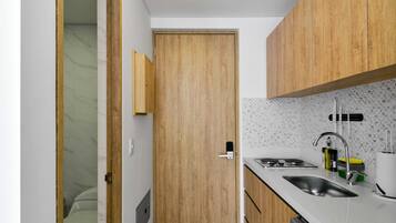 Fridge, microwave, stovetop, coffee/tea maker