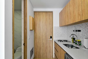 Fridge, microwave, stovetop, coffee/tea maker