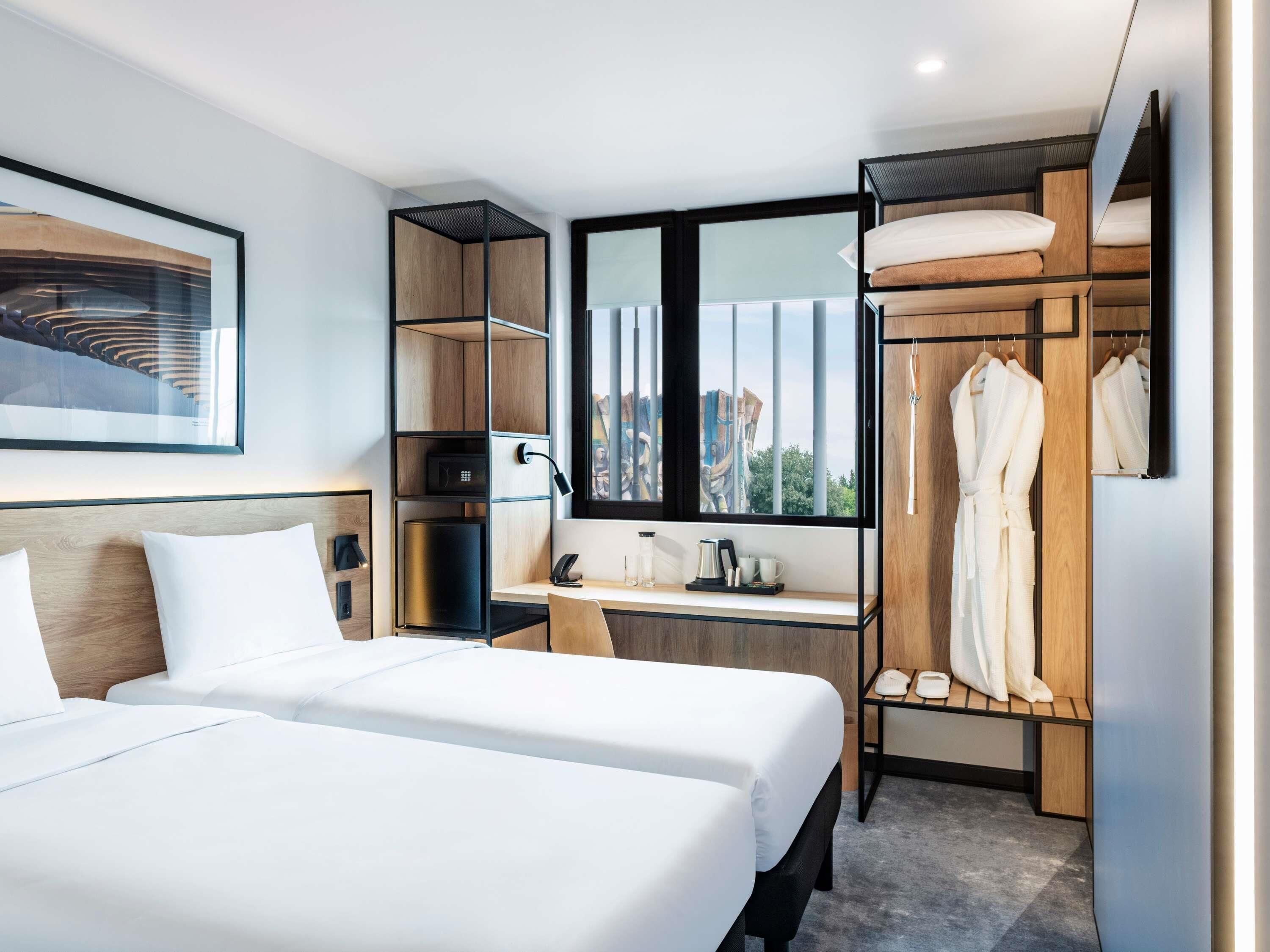 Chambre Standard avec lits jumeaux, 2 lits une place | Coffres-forts dans les chambres, chambres insonorisées