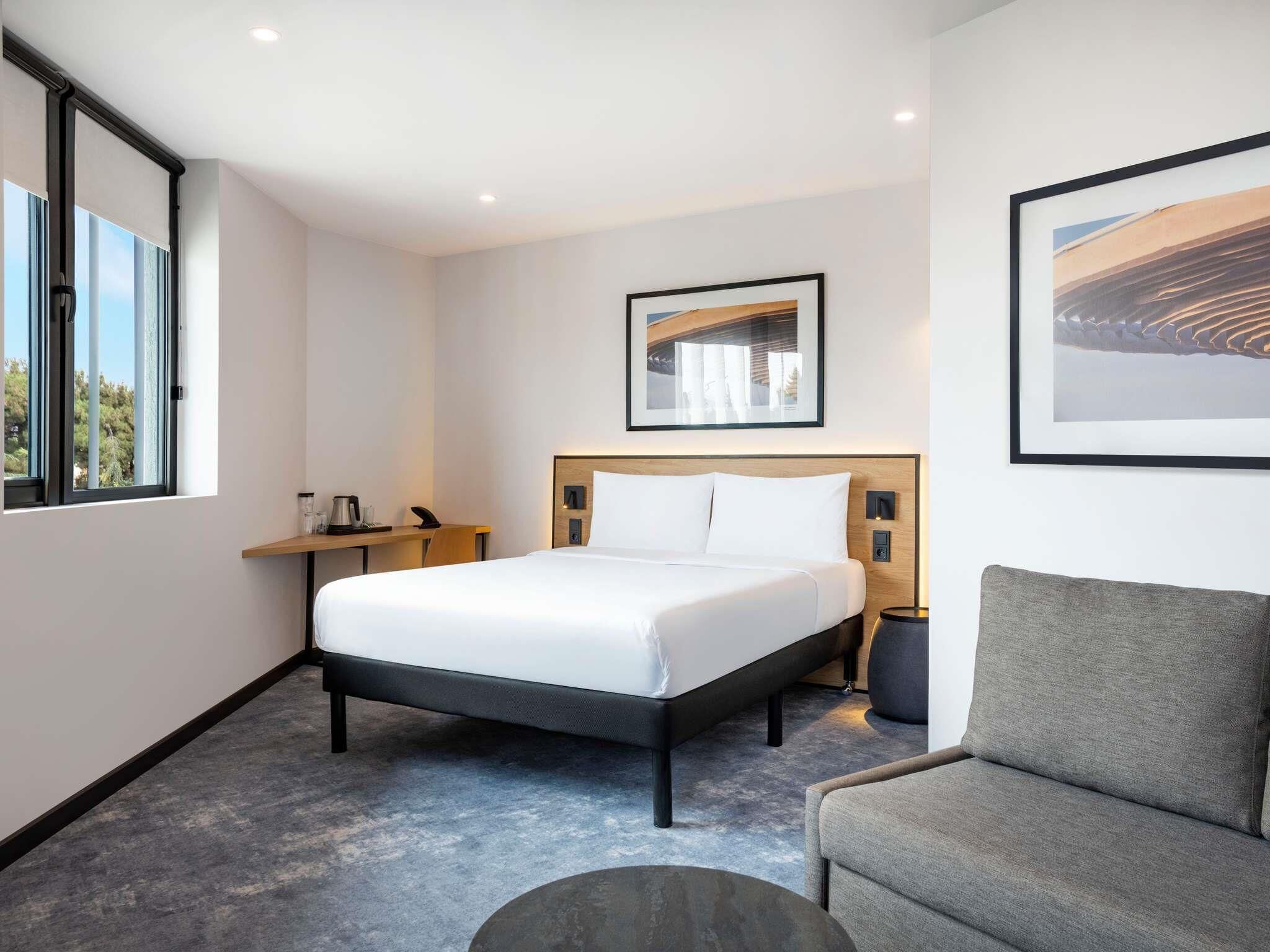 Premium Room (with Sofa) | In-room safe, soundproofing, free wired internet, bed sheets