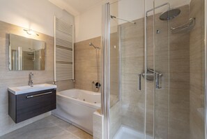 Shower, jetted tub, hair dryer, bidet