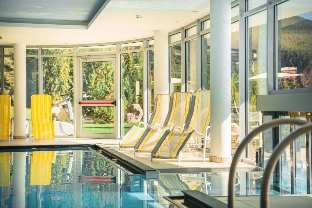 Indoor pool, outdoor pool, pool umbrellas, sun loungers