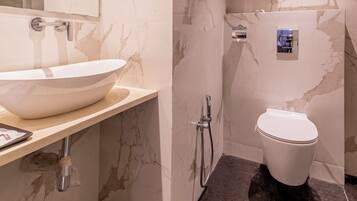 Shower, hair dryer, slippers, towels