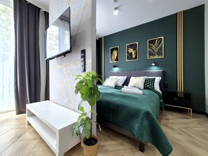 Suite junior | Tabla de planchar con plancha, wifi gratis, ropa de cama