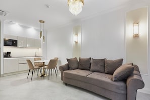 Suite | Tabla de planchar con plancha, wifi gratis y ropa de cama