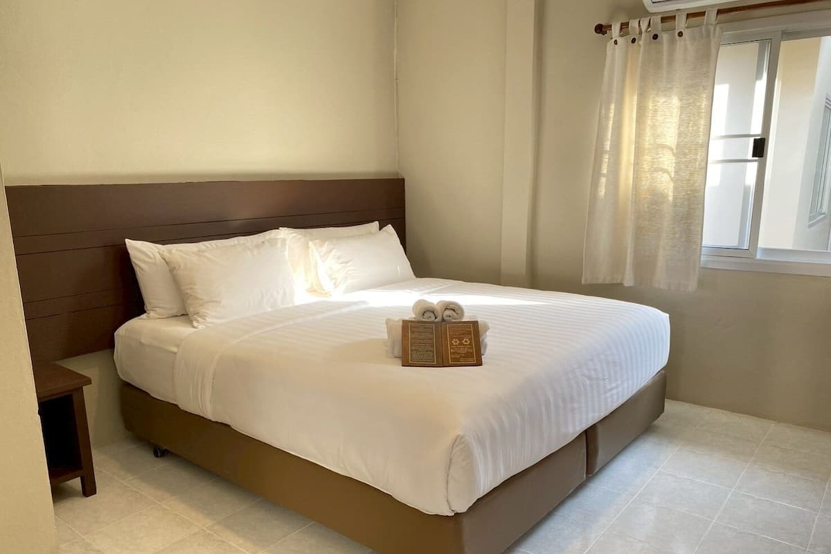 Bungalow King Garden view | Minibar, skrivebord, wi-fi (inkludert) og sengetøy