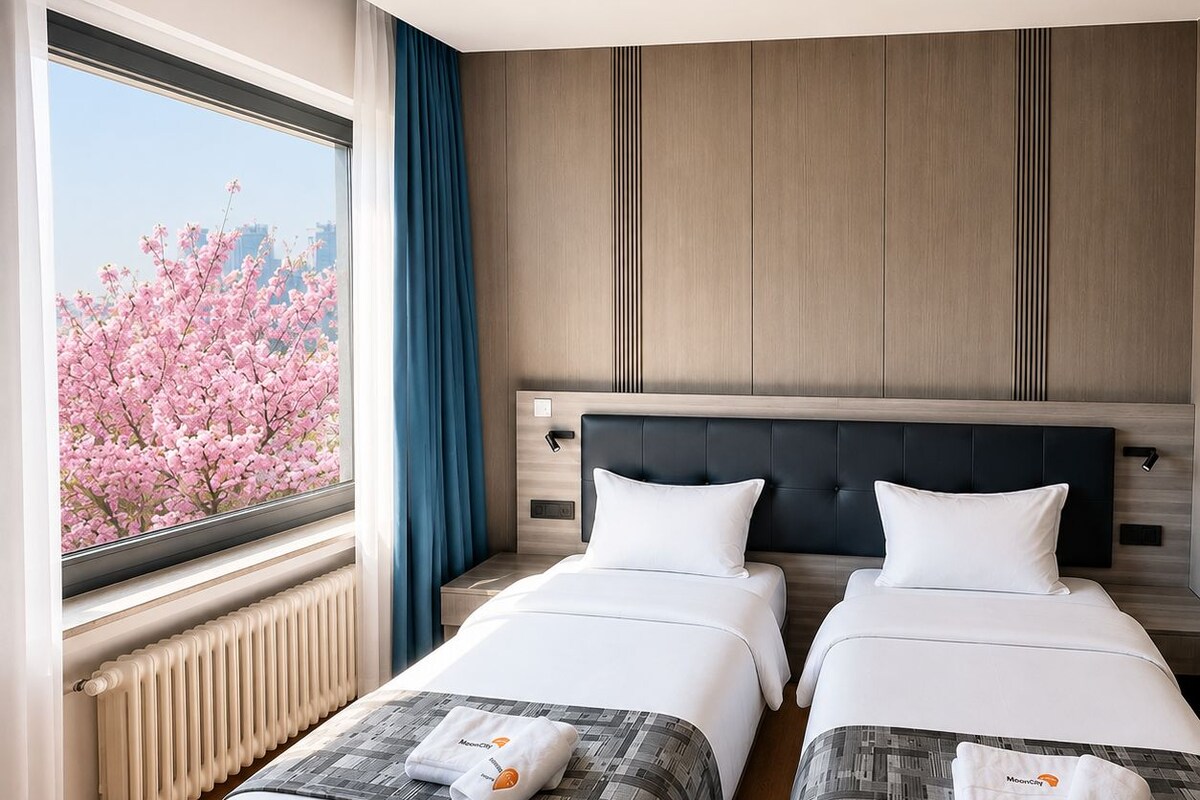 Twin Room, Non Smoking, City View | In-room safe, desk, soundproofing, iron/ironing board (on request)