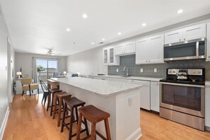 Fridge, microwave, oven, stovetop - Waterfront Two Bedroom Condo with Great Amenities (Ocean City)