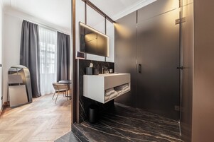 Shower, hair dryer, slippers, towels