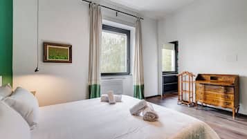 Apartment, 1 Bedroom, Non Smoking, City View | 1 bedroom, desk, laptop workspace, iron/ironing board