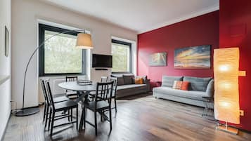 Apartment, 1 Bedroom, Non Smoking, City View | Living area | 32-inch flat-screen TV with cable channels