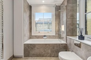 Shower, hair dryer, towels, soap