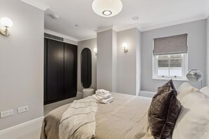 2 bedrooms, desk, iron/ironing board, travel cot