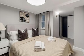 2 bedrooms, desk, iron/ironing board, travel cot