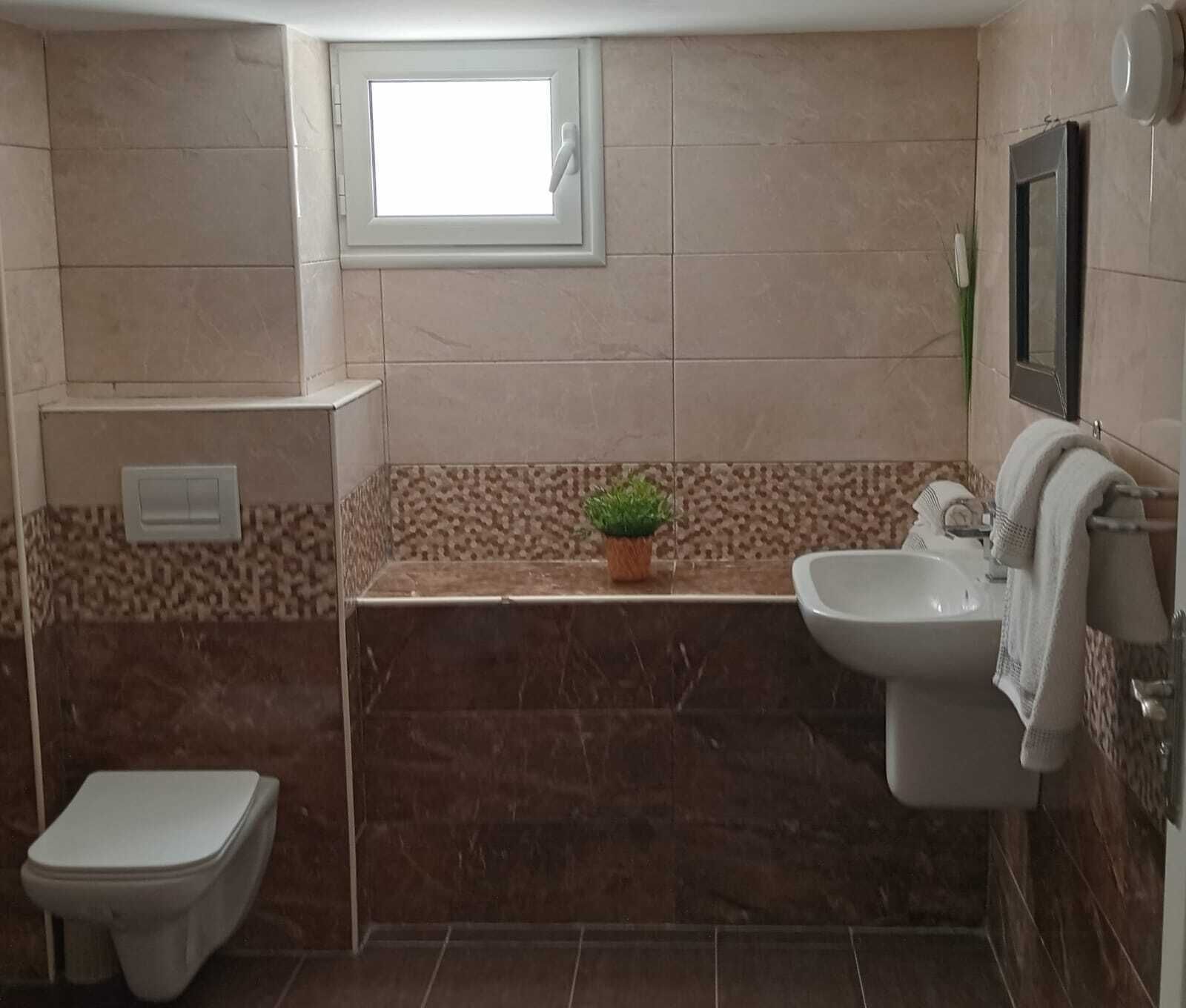 Quadruple Room | Bathroom | Towels, soap