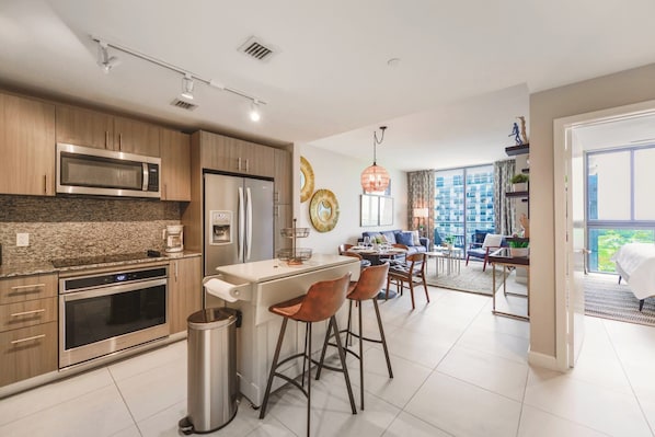 Fridge, microwave, stovetop, dishwasher - Prime Downtown Doral Park Condo (Doral)