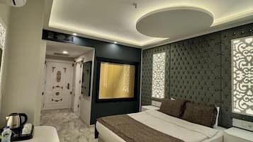 Deluxe Double Room, City View | 1 bedroom, in-room safe, desk, laptop workspace