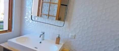Hair dryer, towels, soap, shampoo
