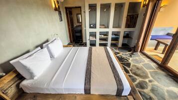 Deluxe Double Room, Beach View | Minibar, in-room safe, free WiFi