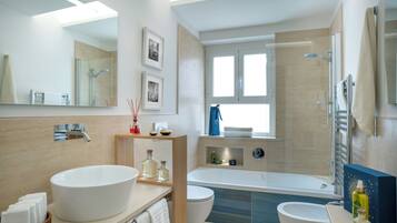 Superior Condo | Bathroom | Shower, bidet, towels, toilet paper