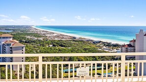 A coastal view from a balcony with a 'Please, Keep Off' sign, beach, and ocean. - Book 3 Nights Get 1 Free* See Description*Walk To Beach*Waterfall Pool With Tram (Miramar Beach)