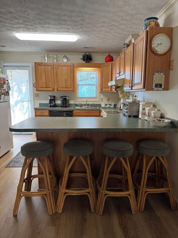 Fridge, microwave, oven, stovetop - Welcome to Sandy Stilts: Charming Vintage Beach House Rental in Surfside Beach! (Surfside Beach)