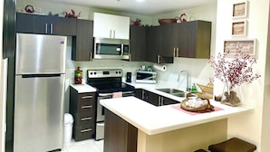 Apartemen | Dapur pribadi | Lemari es, microwave, oven, dan kompor