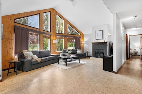 Living area. 3 Bedroom Cabin, minute walk from St Malo Lake, Beach & Provincial Park!