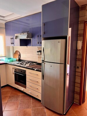 Fridge, microwave, oven, stovetop - Cozy 1-bedroom apartment 150m from the beach in lovely Imi Ouaddar (Imi Ouaddar)