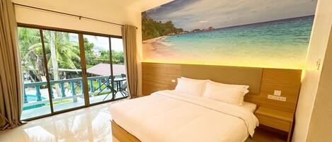 Deluxe Suite, Pool View | In-room safe, blackout curtains, free WiFi, bed sheets