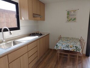 Fridge, stovetop, toaster, cookware/dishes/utensils