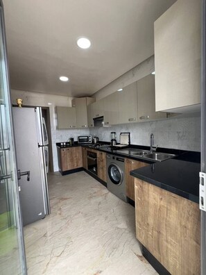 Private kitchen - Agadir Bay, a comfy apartment with pool (Agadir)