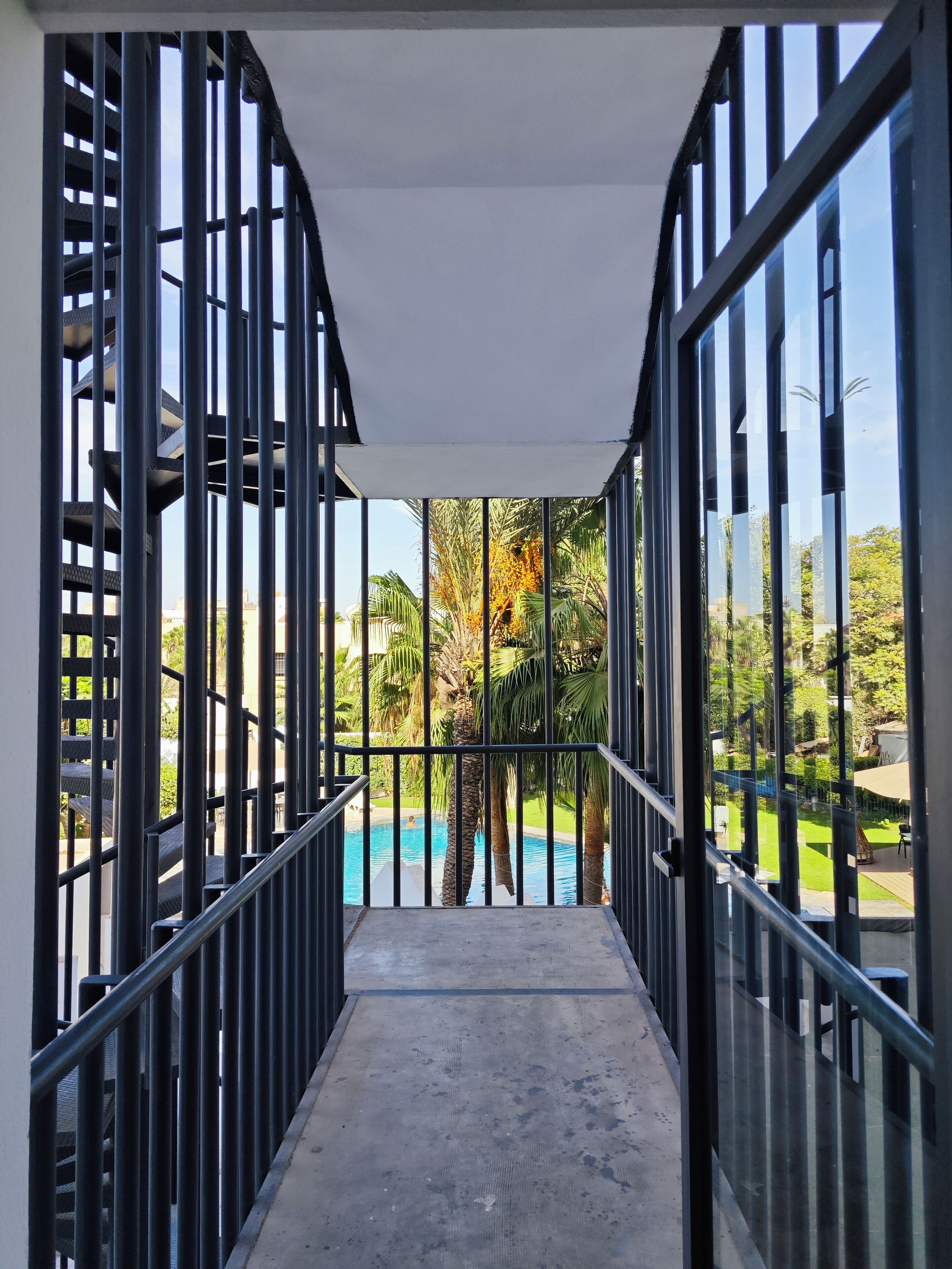 Triple Room, Pool View | Living area