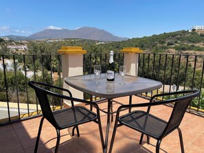 Outdoor dining - Charming 3-BR duplex with sea & mountain views in brilliant Bahía de Casares.  (Bahía de Casares)