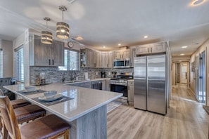 Fridge, oven, dishwasher, coffee/tea maker