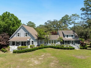 Enjoy two screened-in porches and backyard space aplenty at this home!