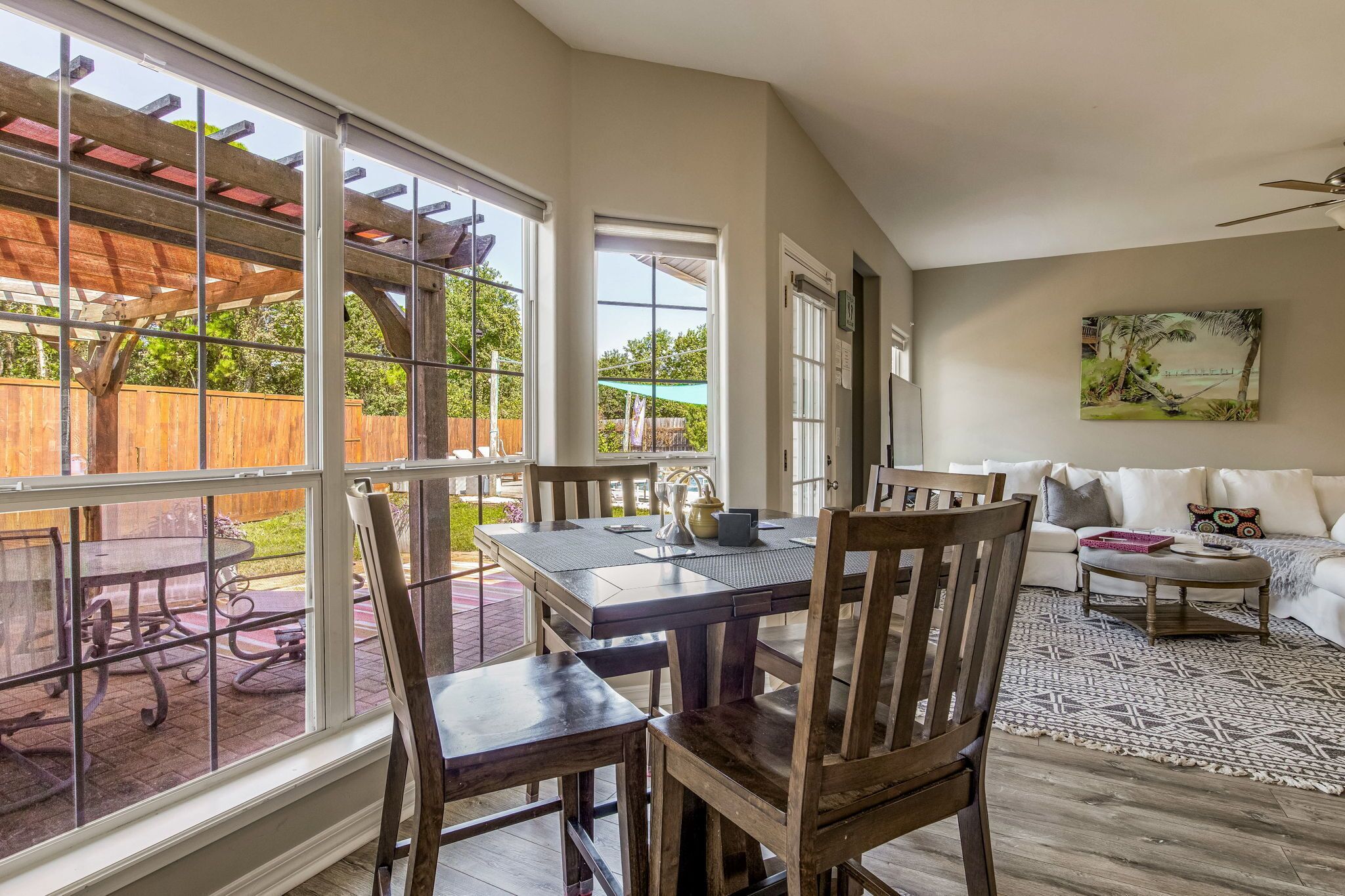 Dining table and extra seating at the spacious kitchen counter.
