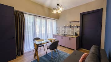 Comfort Apartment, Balcony, Garden View | 1 bedroom, in-room safe, desk, laptop workspace