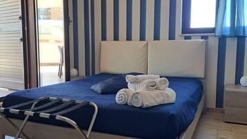 Deluxe Double Room, Garden View | In-room safe, desk, blackout curtains, iron/ironing board