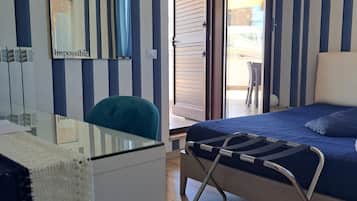 Deluxe Double Room, Garden View | 2 bedrooms, in-room safe, desk, blackout drapes