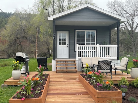 Terrace/patio. Tiny Home Cabin with Wyoming Modern Frontier style in the town of Hulett
