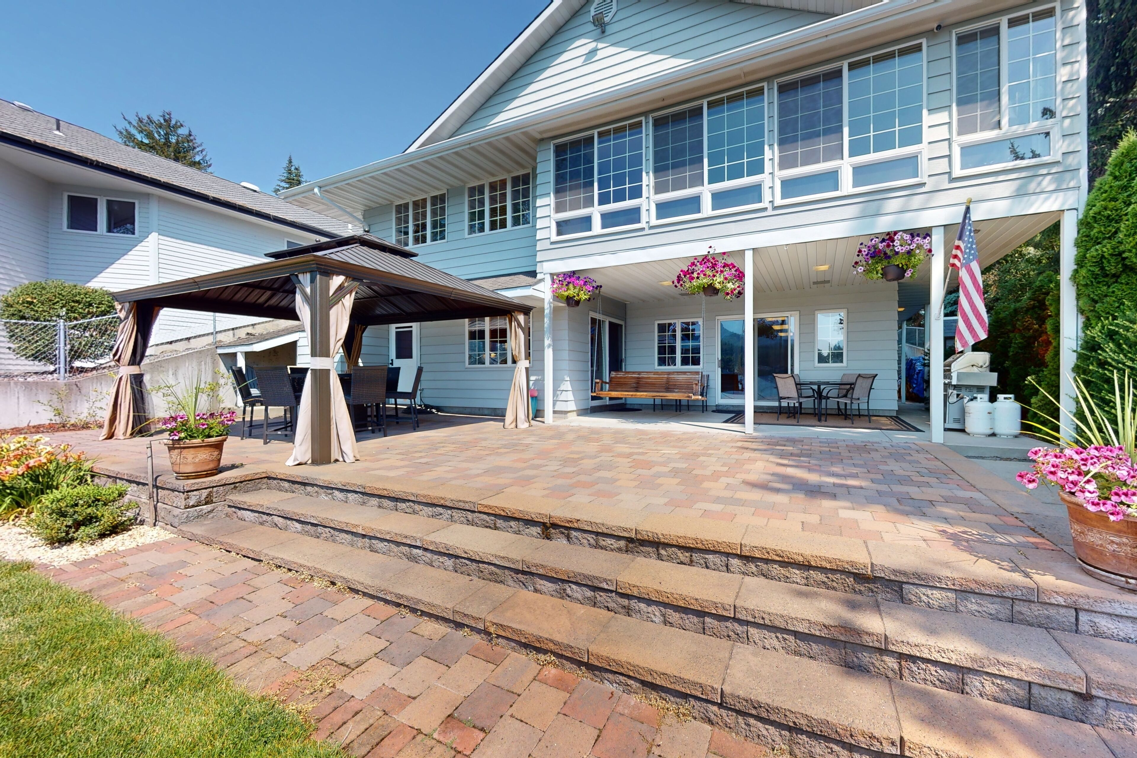 Beautiful riverfront home with private dock, patio, pool table, WiFi, and W/D