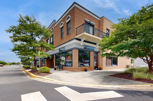 Village of Five Points condo with pool, gym, and tennis access