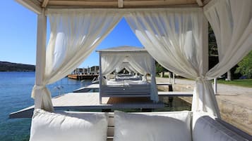 Private beach, scuba diving, windsurfing, beach volleyball