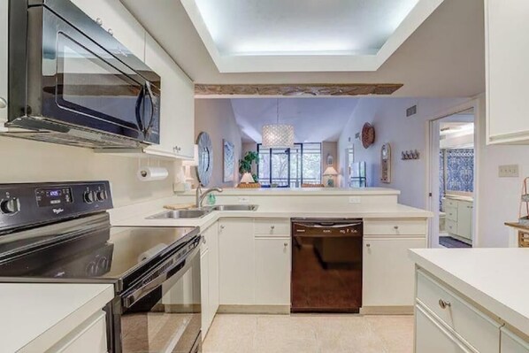 Fridge, microwave, oven, stovetop - Spacious, Bright Condo at Wild Pines in Bonita Bay, Bonita Springs, FL (Bonita Springs)