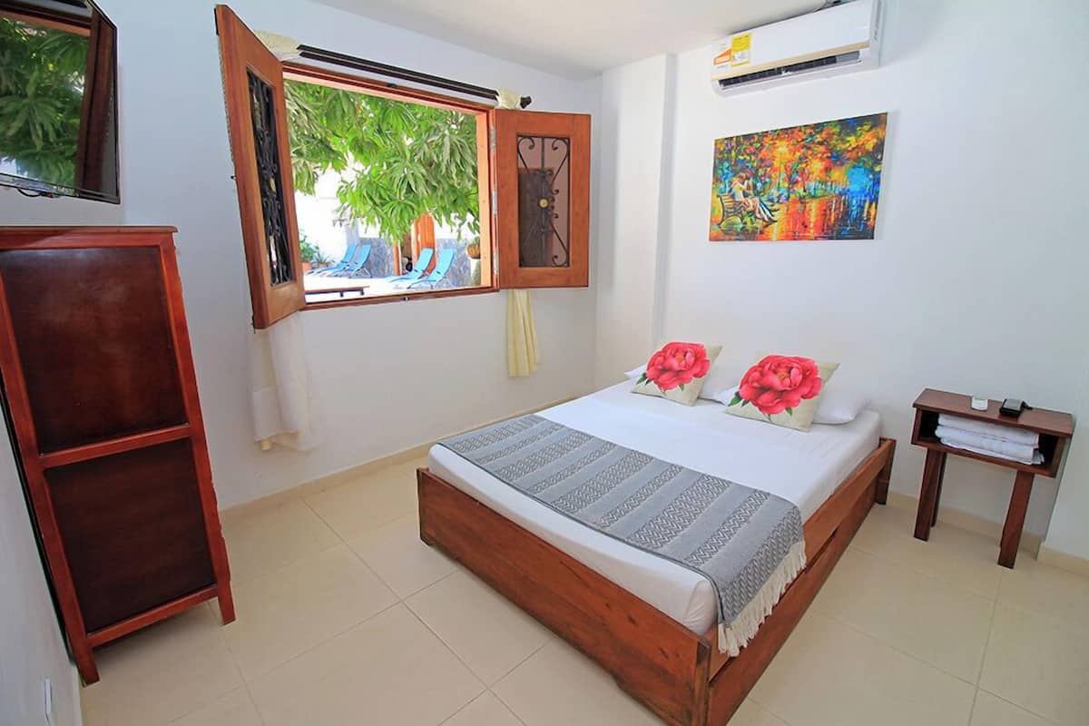 Basic Room, Pool View | 2 bedrooms, desk, free WiFi