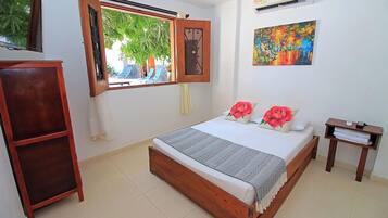 Basic Room, Pool View | Desk, free WiFi