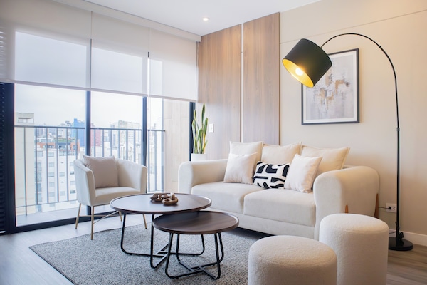 Apartment, 3 Bedrooms (1004) | Living area | 40-inch Smart TV with cable channels